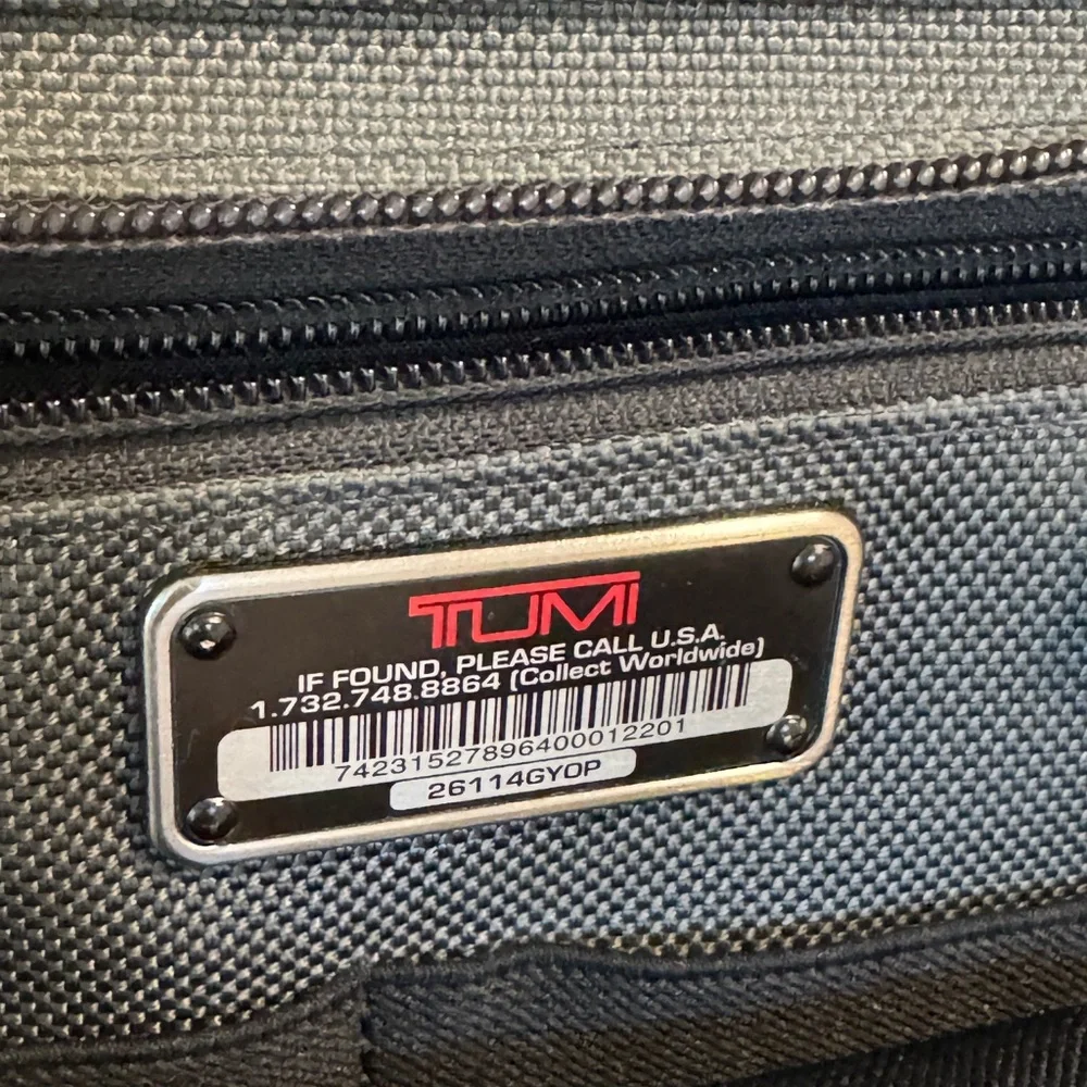 TUMI Men’s Travel Briefcase Leather handles